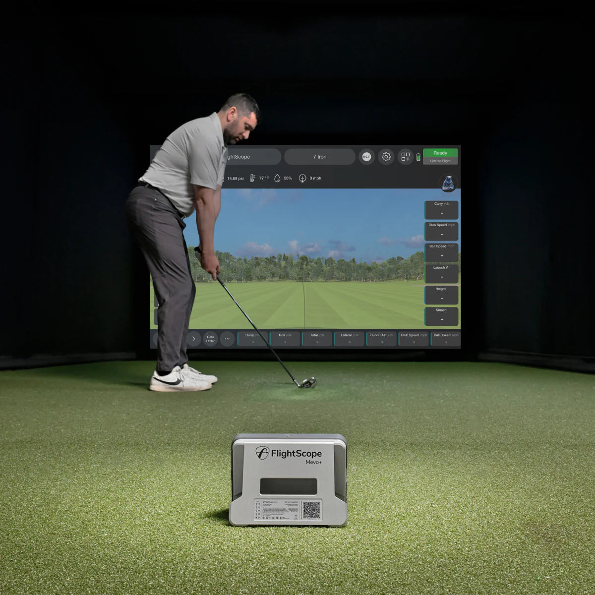 flightscope mevo plus launch monitor indoor with golfer