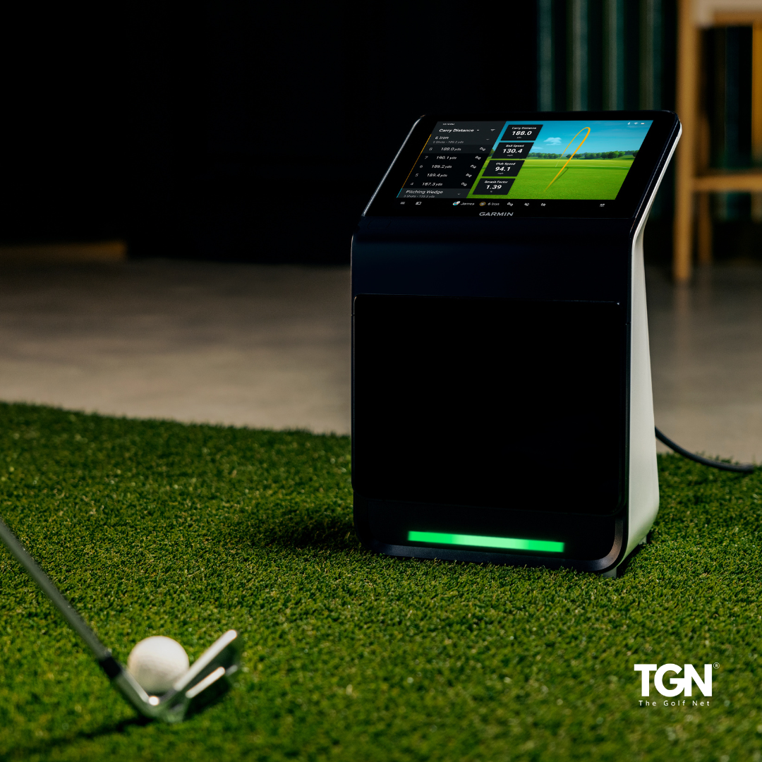 Garmin R50 in indoor golf setup on turf