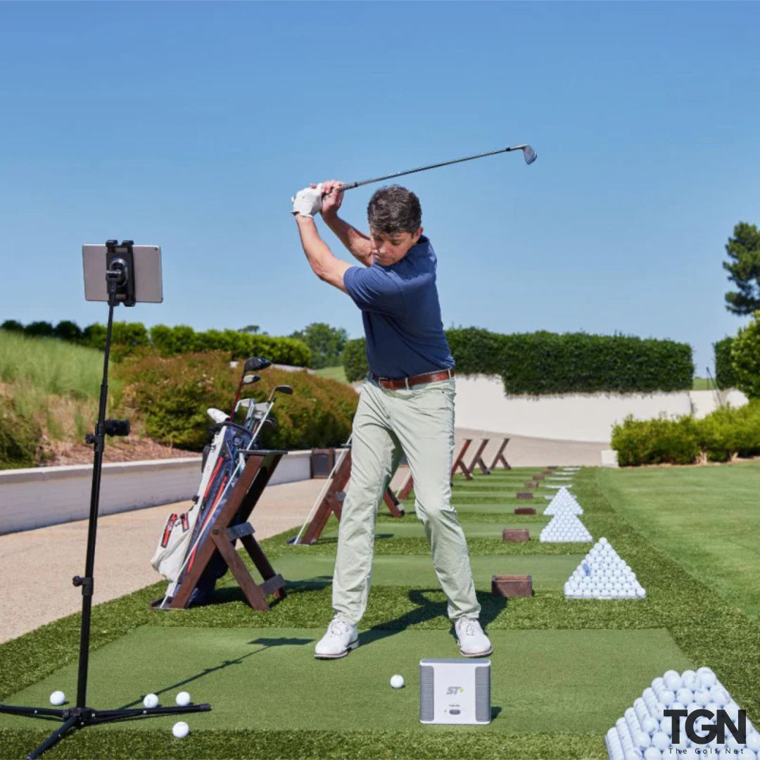 SkyTrak+ setup on driving range turf